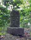 a precarious stone buddha